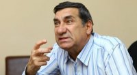 Arif Quliyevin traktoru çaya aşdı – Qolu çıxdı