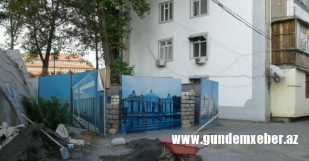 İcra başçısı binanın girişini milyarderin cangüdəninə satıb - FOTOLAR