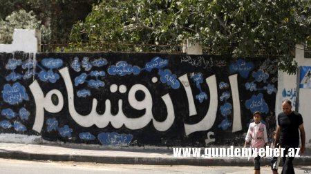 Həmas Abbası Qəzzənin nəzarətini geri almağa çağırıb