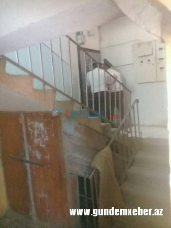 Bakıda banka dollar borcu olan qadın mənzilində ÖZÜNÜ YANDIRMAQ İSTƏYİR - FOTOLAR