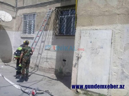 Bakıda banka dollar borcu olan qadın mənzilində ÖZÜNÜ YANDIRMAQ İSTƏYİR - FOTOLAR