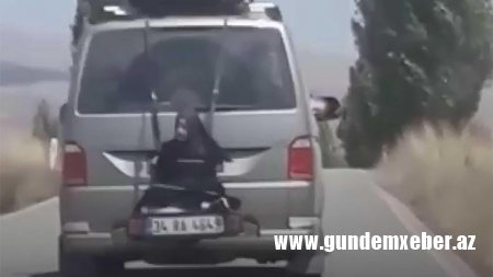 Qadını mikroavtobusun arxasına bağladılar - Rəzalət