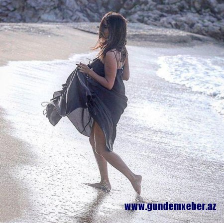 Günelin ətəyini qaldırdığı fotosu tənqid edildi