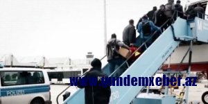 Almaniyadan qovulan miqrantlar: onlar polisi cırmaqlayır, tüpürür, təpik atır...