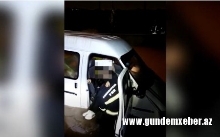Bakıda yağış sularının içərisində qalanların xilas olunmasının görüntüləri