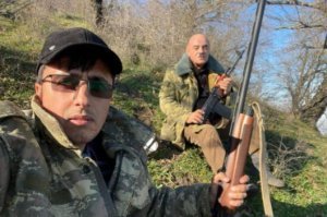 DİN silahla foto paylaşan nazirlik əməkdaşları haqda araşdırmaya başladı